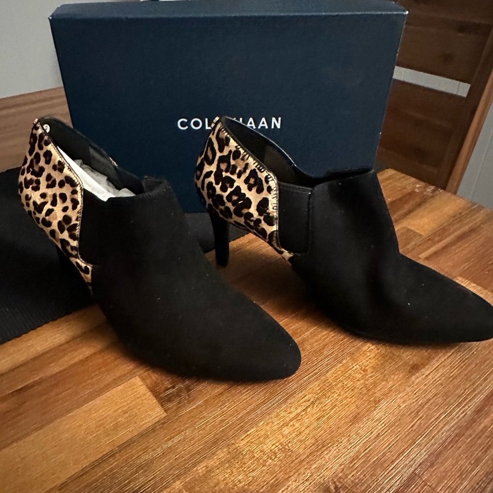 Clea Haan woman’s black suede and ocelot boots